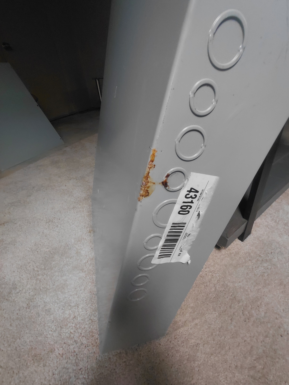 Gray Metal Shelf End Panel with Circular Knockouts